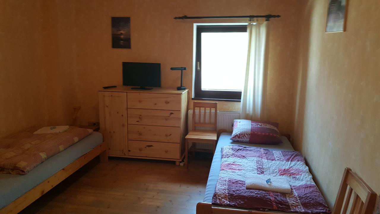 Třílůžkový pokoj